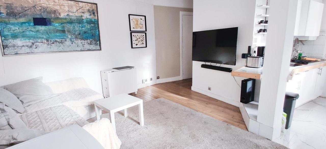 Luxueux Appartement Sur Jardin Parigi Esterno foto