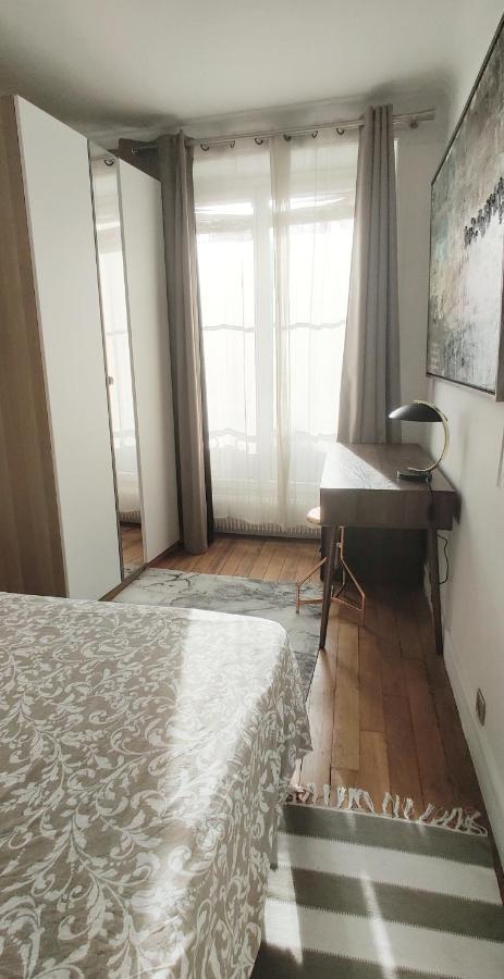 Luxueux Appartement Sur Jardin Parigi Esterno foto