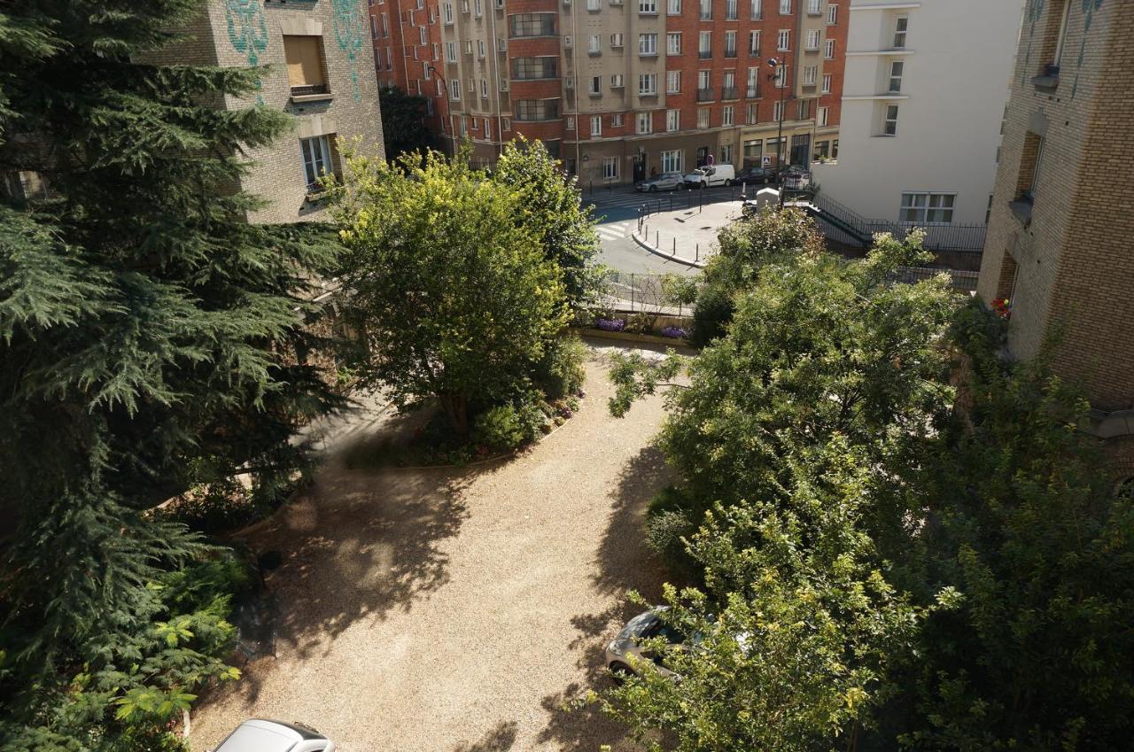 Luxueux Appartement Sur Jardin Parigi Esterno foto